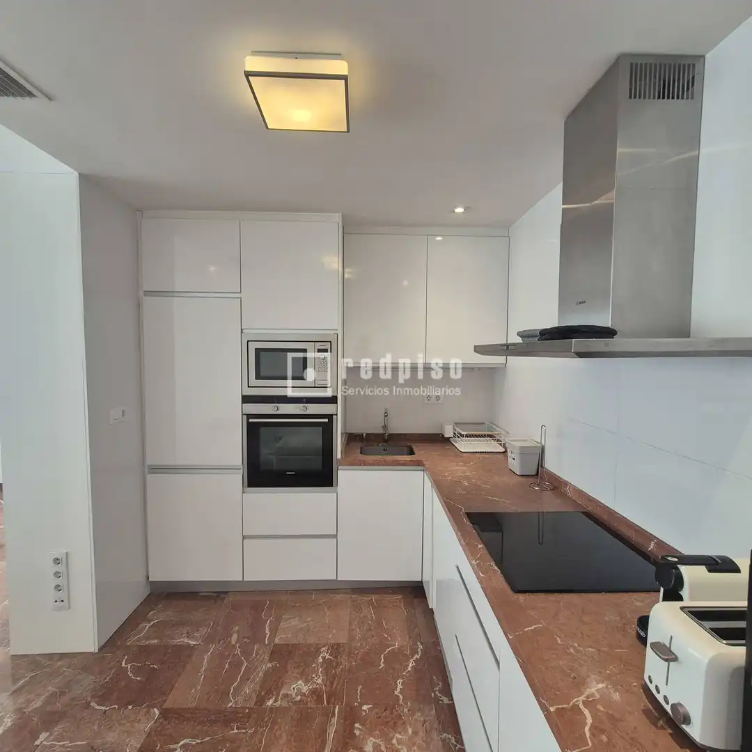 Kitchen of Flat for rent in Sevilla  with Air Conditioner, Terrace and Storage room