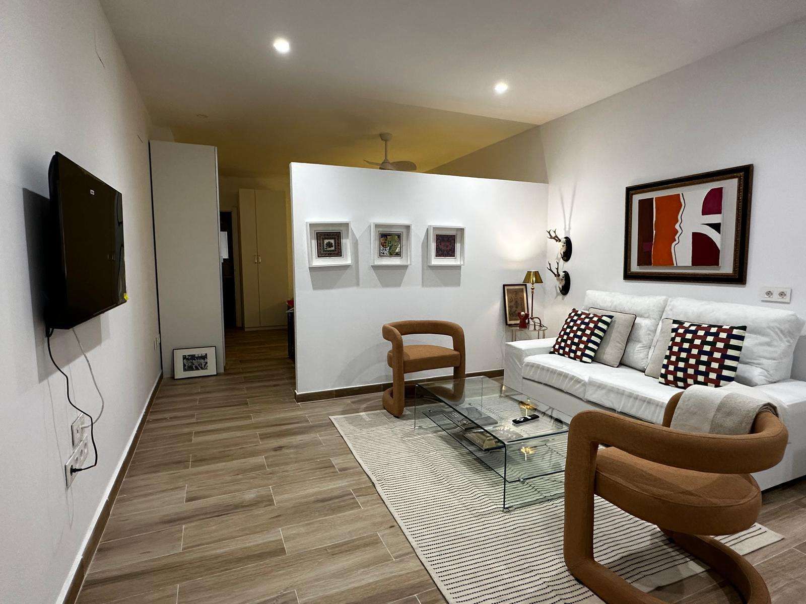 Living room of Apartment to share in  Sevilla Capital  with Heating and Terrace