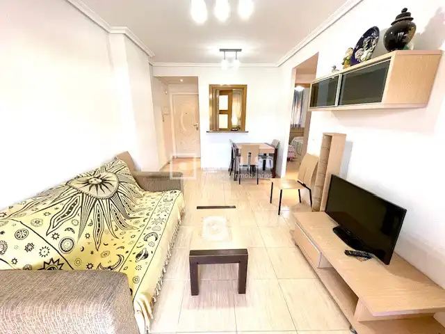 Sala d'estar de Apartament en venda en Oropesa del Mar / Orpesa amb Aire condicionat, Jardí privat i Terrassa