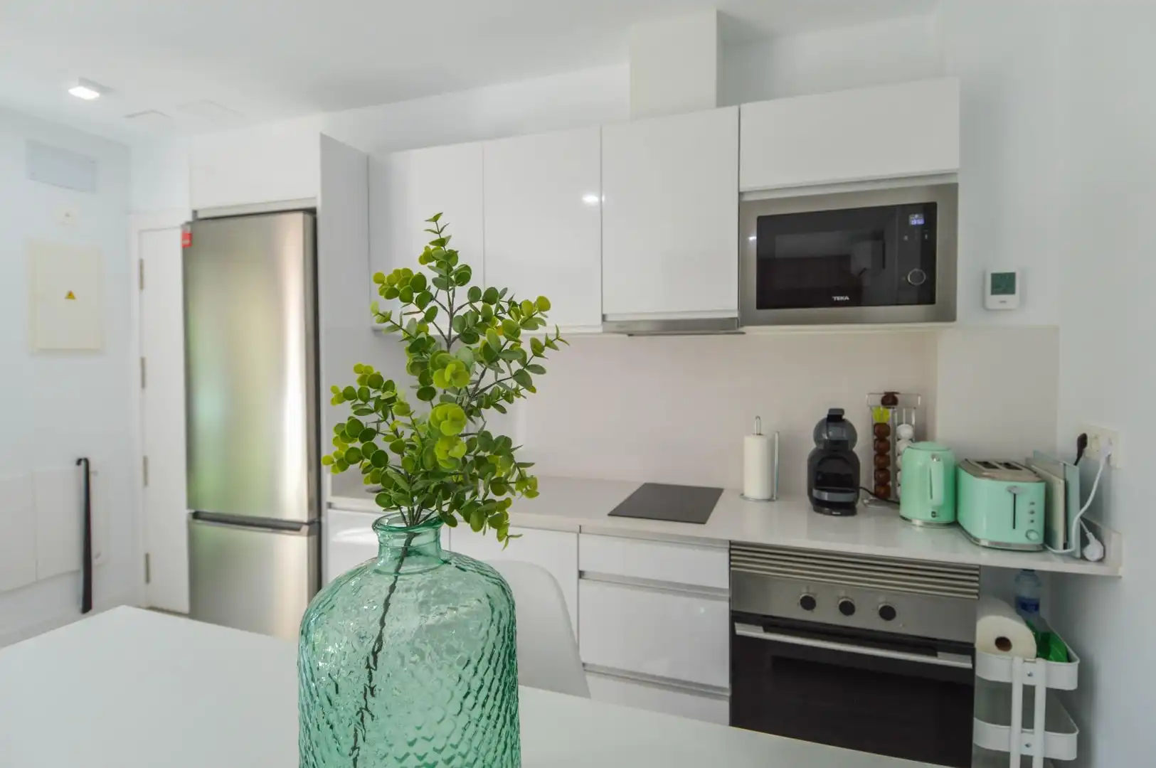Cuina de Apartament de lloguer en Mogán amb Aire condicionat, Jardí privat i Terrassa