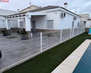 Exterior view of House or chalet for sale in Dos Hermanas  with Air Conditioner, Heating and Private garden