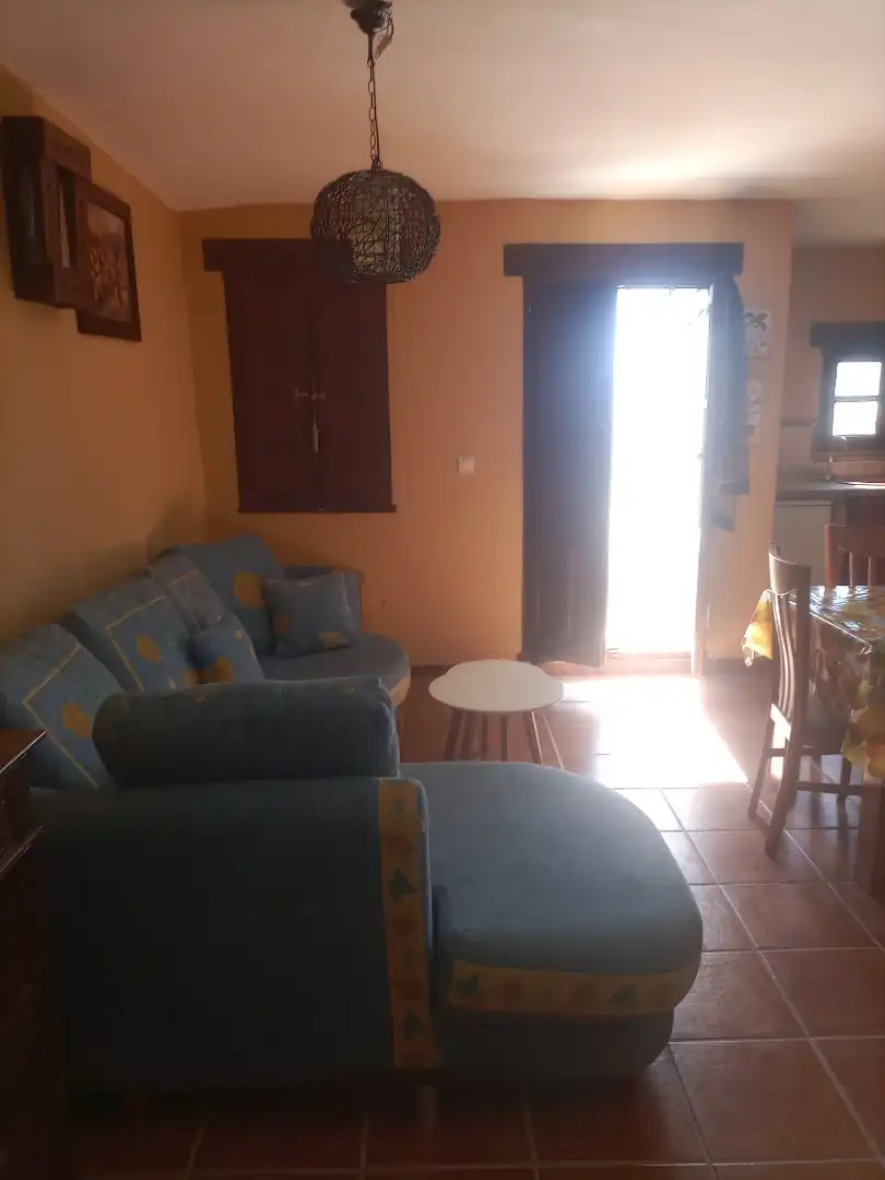 Sala de estar de Apartamento en venta en Alpujarra de la Sierra con Calefacción, Amueblado y Microondas