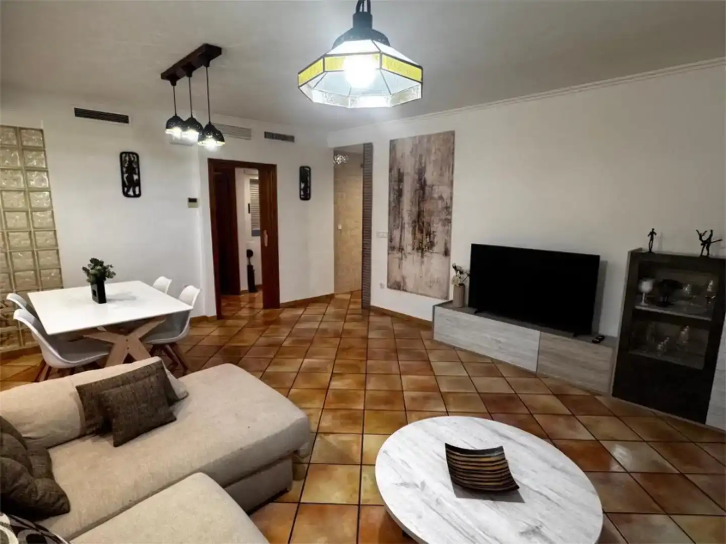 Sala d'estar de Àtic de lloguer en Dénia amb Aire condicionat, Traster i Moblat