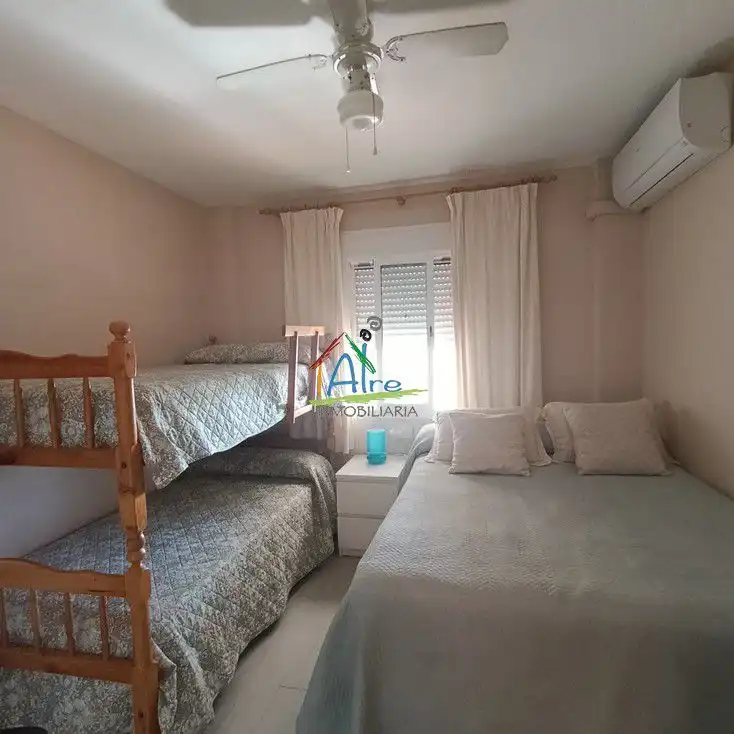 Dormitori de Apartament en venda en Almonte amb Aire condicionat, Terrassa i Piscina comunitària