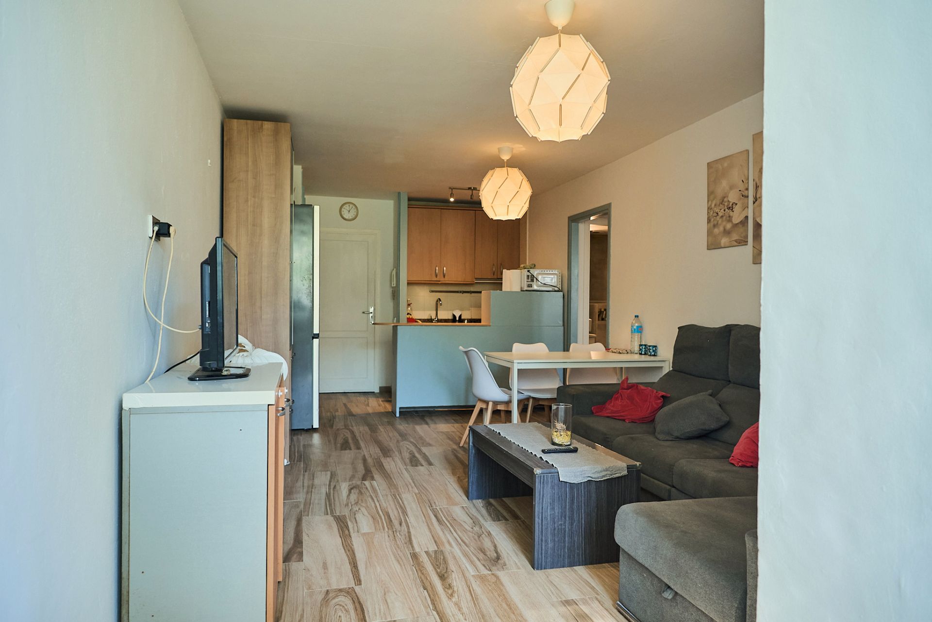 Sala d'estar de Apartament en venda en Sant Antoni de Portmany amb Moblat i Piscina comunitària