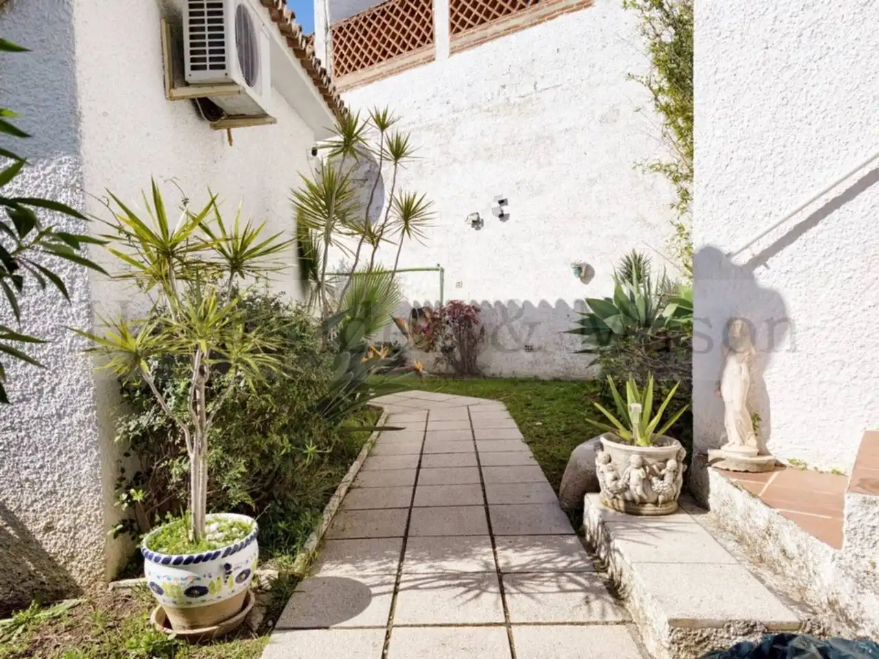 Garden of Houses for sale in Benalmádena  with Air Conditioner, Terrace and Swimming Pool