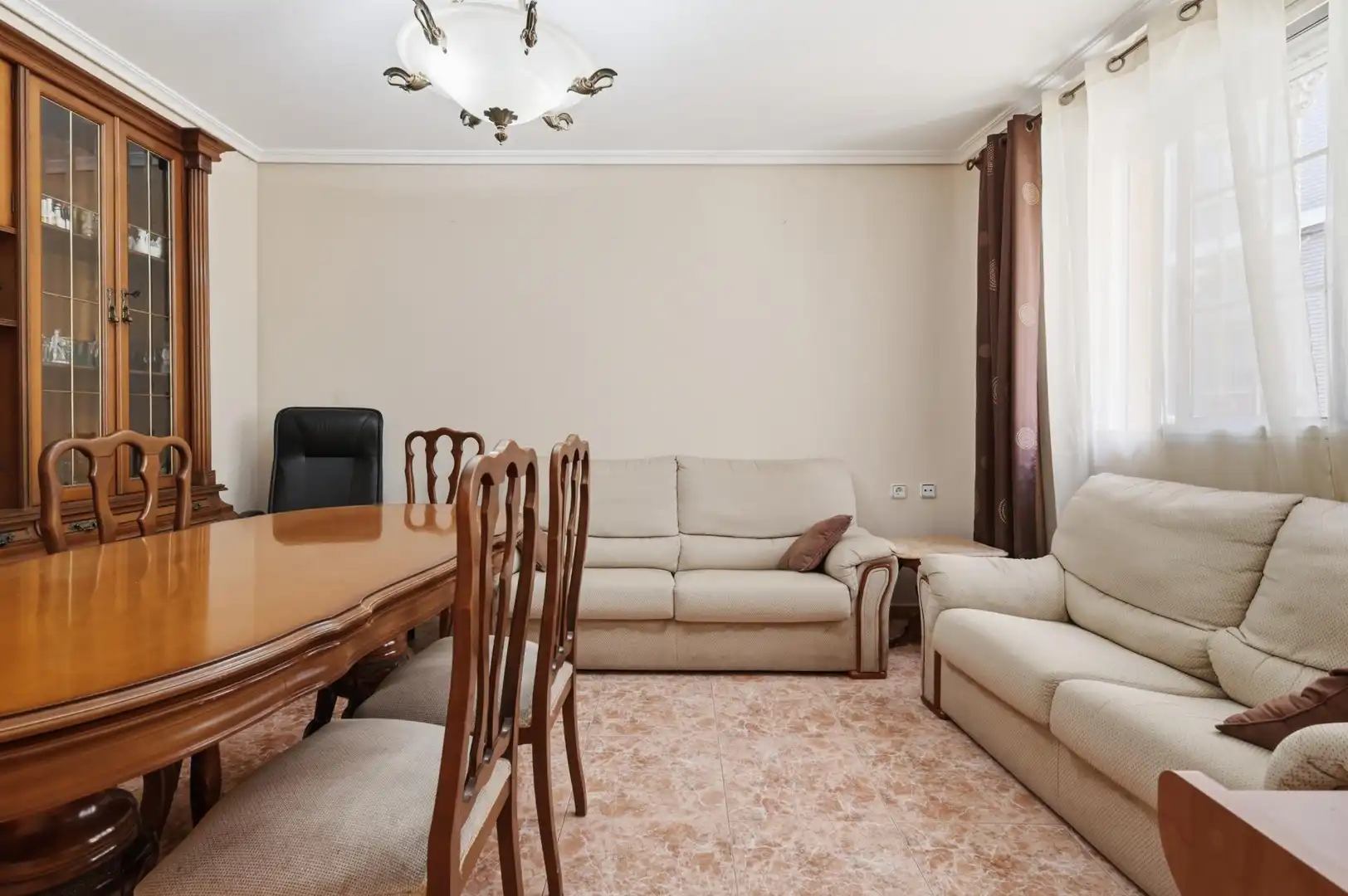 Sala d'estar de Casa adosada en venda en Torrent