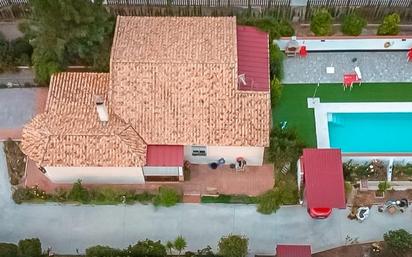 Vista exterior de Casa o xalet en venda en La Carlota amb Aire condicionat i Piscina