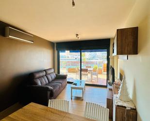 Sala d'estar de Apartament de lloguer en Roses amb Aire condicionat, Terrassa i Moblat