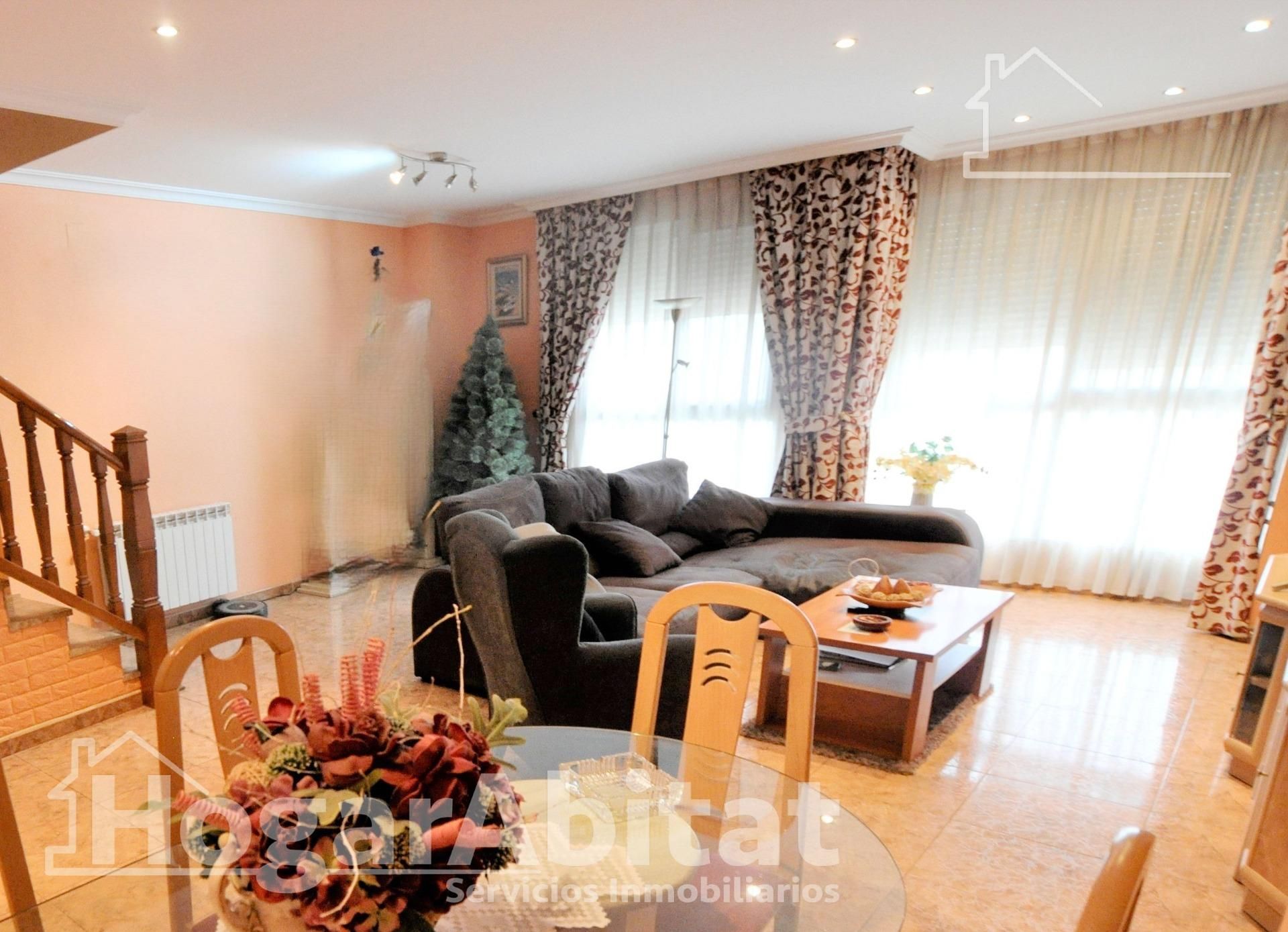 Sala de estar de Casa adosada en venta en Puçol con Aire acondicionado, Terraza y Trastero