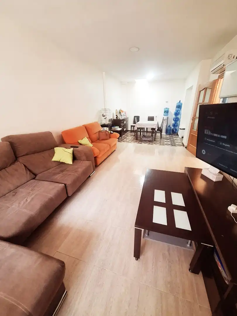 Sala de estar de Casa adosada en venta en El Ejido con Aire acondicionado, Terraza y Amueblado