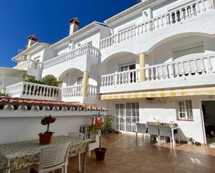 Exterior view of Single-family semi-detached for sale in Benalmádena  with Air Conditioner, Terrace and Community pool