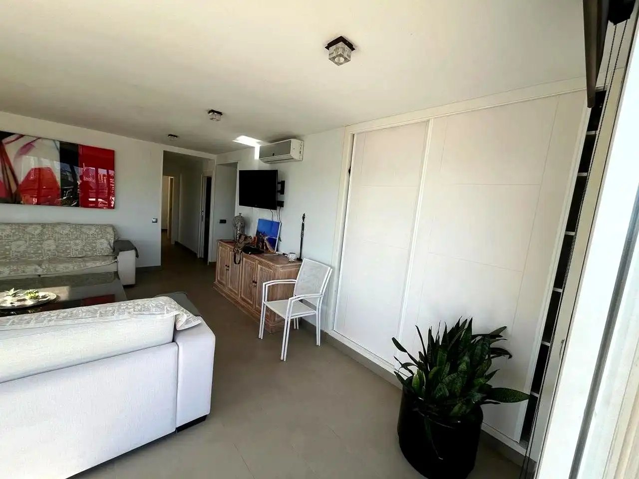 Sala de estar de Ático en venta en Benidorm con Aire acondicionado, Terraza y Piscina comunitaria