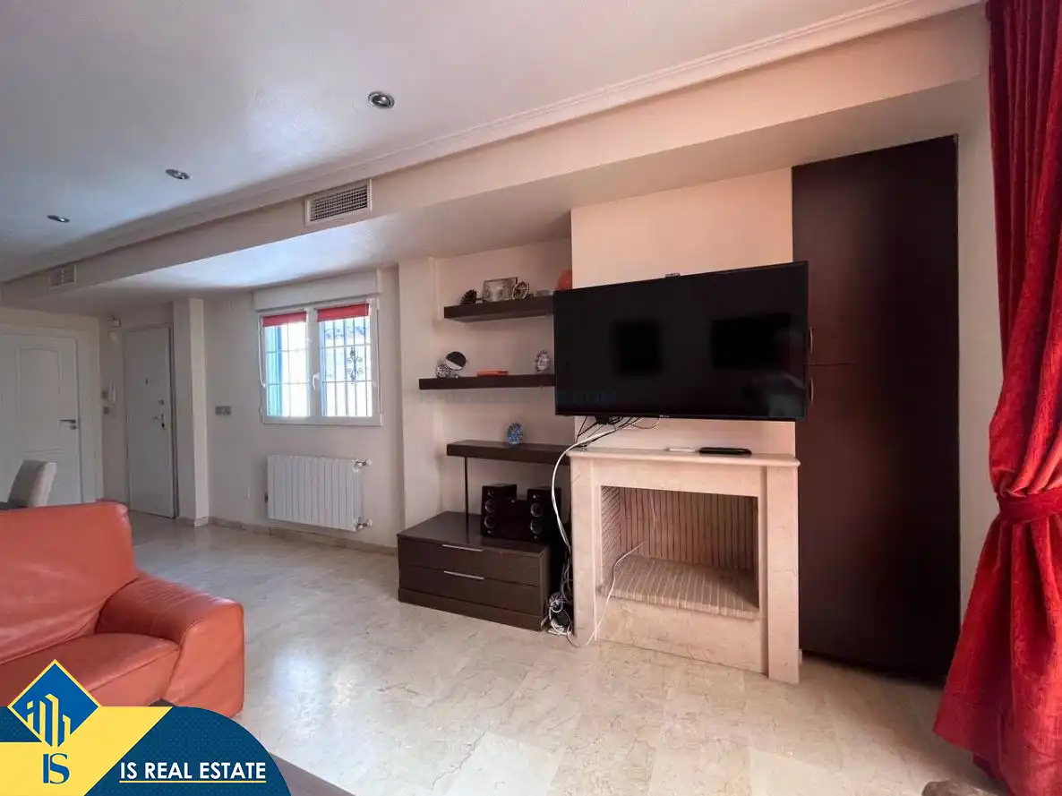 Sala de estar de Casa adosada en venta en Guardamar del Segura con Aire acondicionado, Calefacción y Jardín privado
