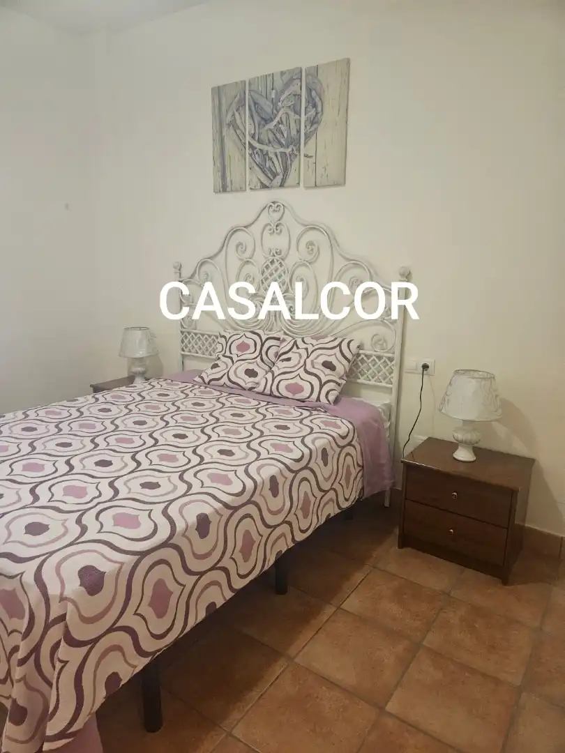 Habitación de Casa adosada de alquiler en Mairena del Alcor con Aire acondicionado, Amueblado y Horno