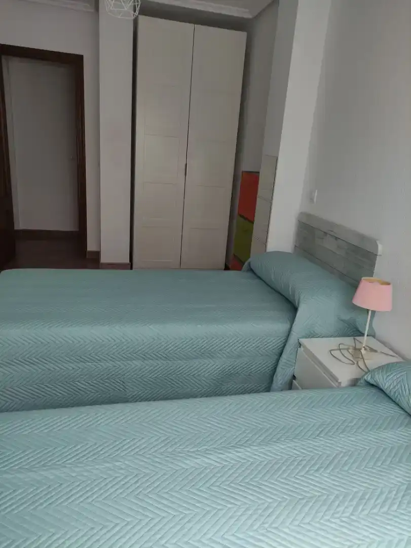 Schlafzimmer von Dachboden zur Miete in Meruelo mit Schwimmbad