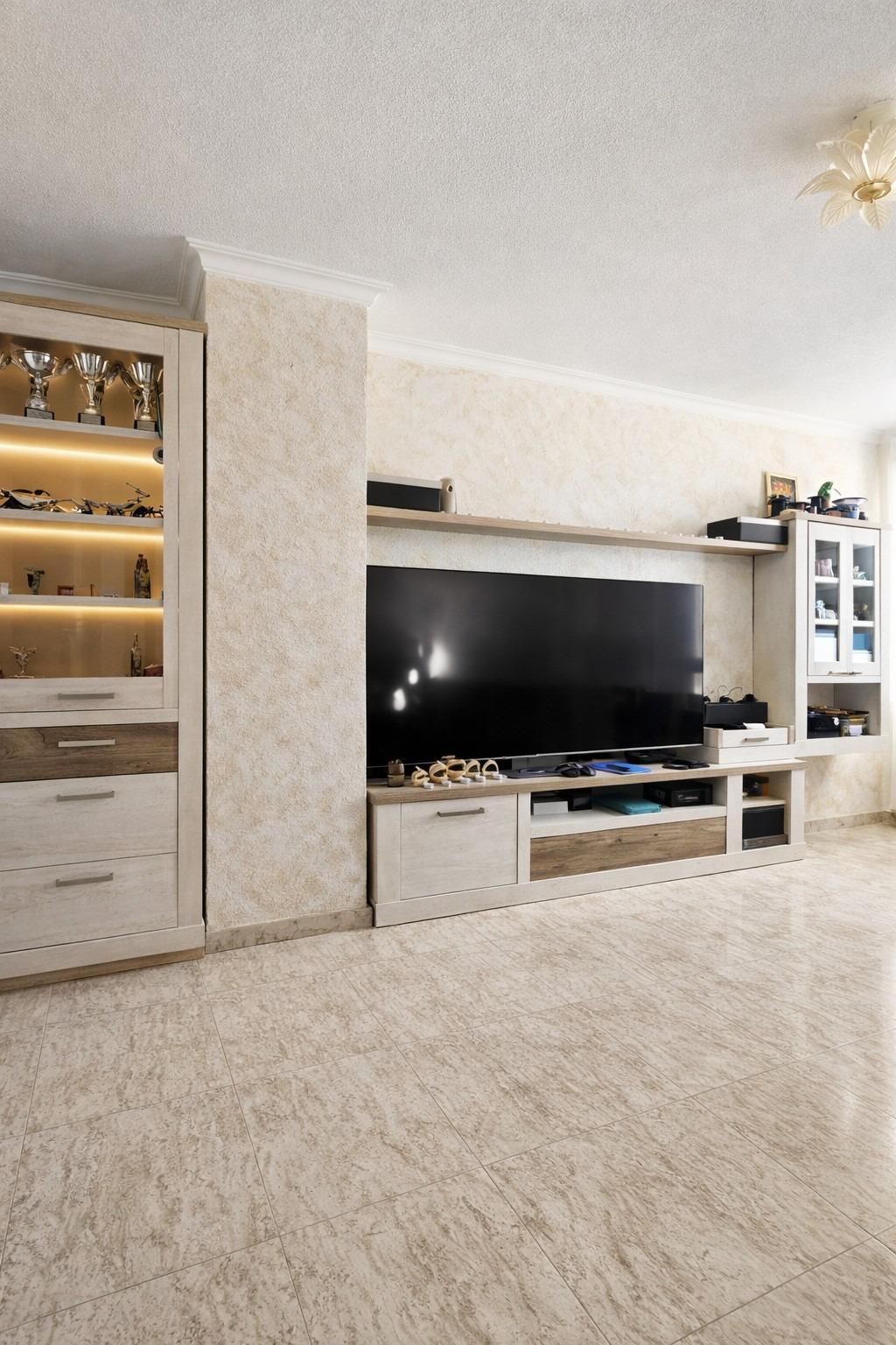 Sala d'estar de Apartament en venda en Benalmádena amb Aire condicionat i Piscina comunitària