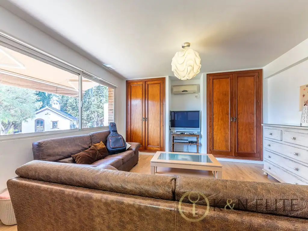 Sala d'estar de Casa o xalet en venda en Sant Joan d'Alacant amb Aire condicionat, Jardí privat i Terrassa