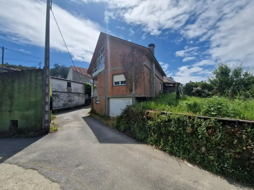 Vista exterior de Casa o xalet en venda en Rianxo amb Jardí privat, Traster i Balcó