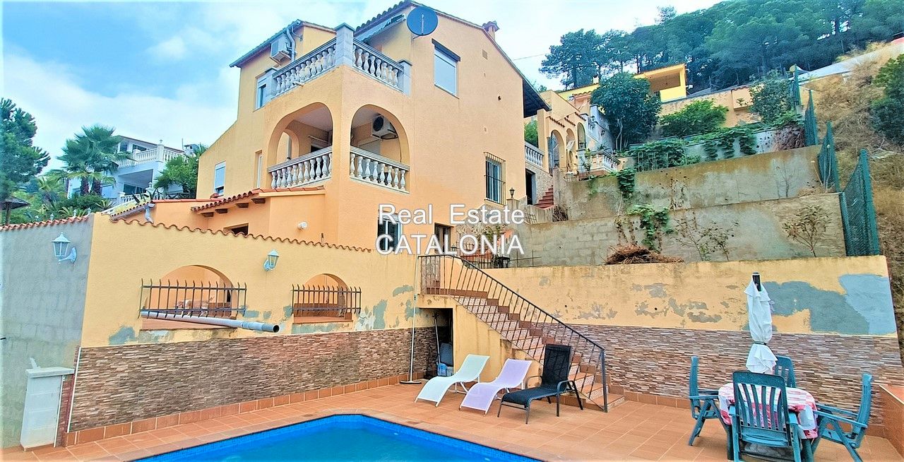 Exterior view of House or chalet for sale in Lloret de Mar  with Air Conditioner, Heating and Private garden