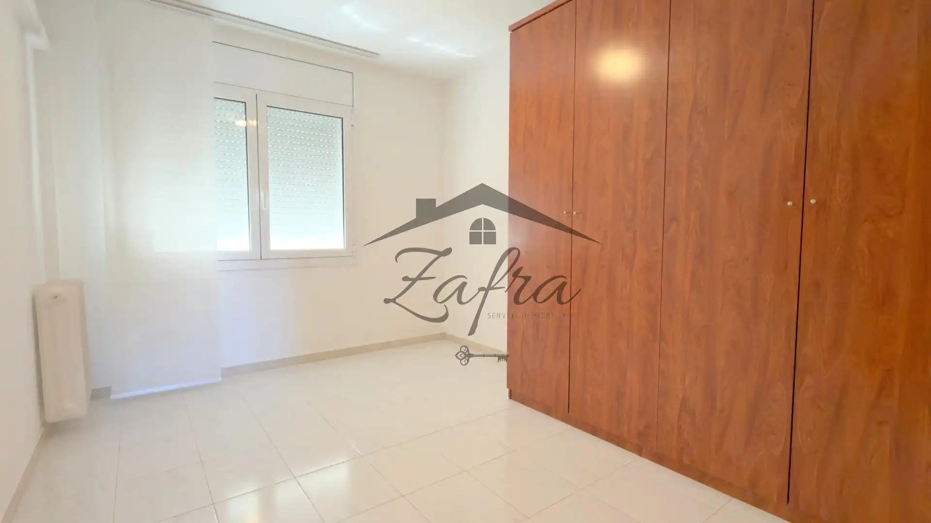 Sala d'estar de Casa adosada en venda en Girona amb Calefacció i Terrassa
