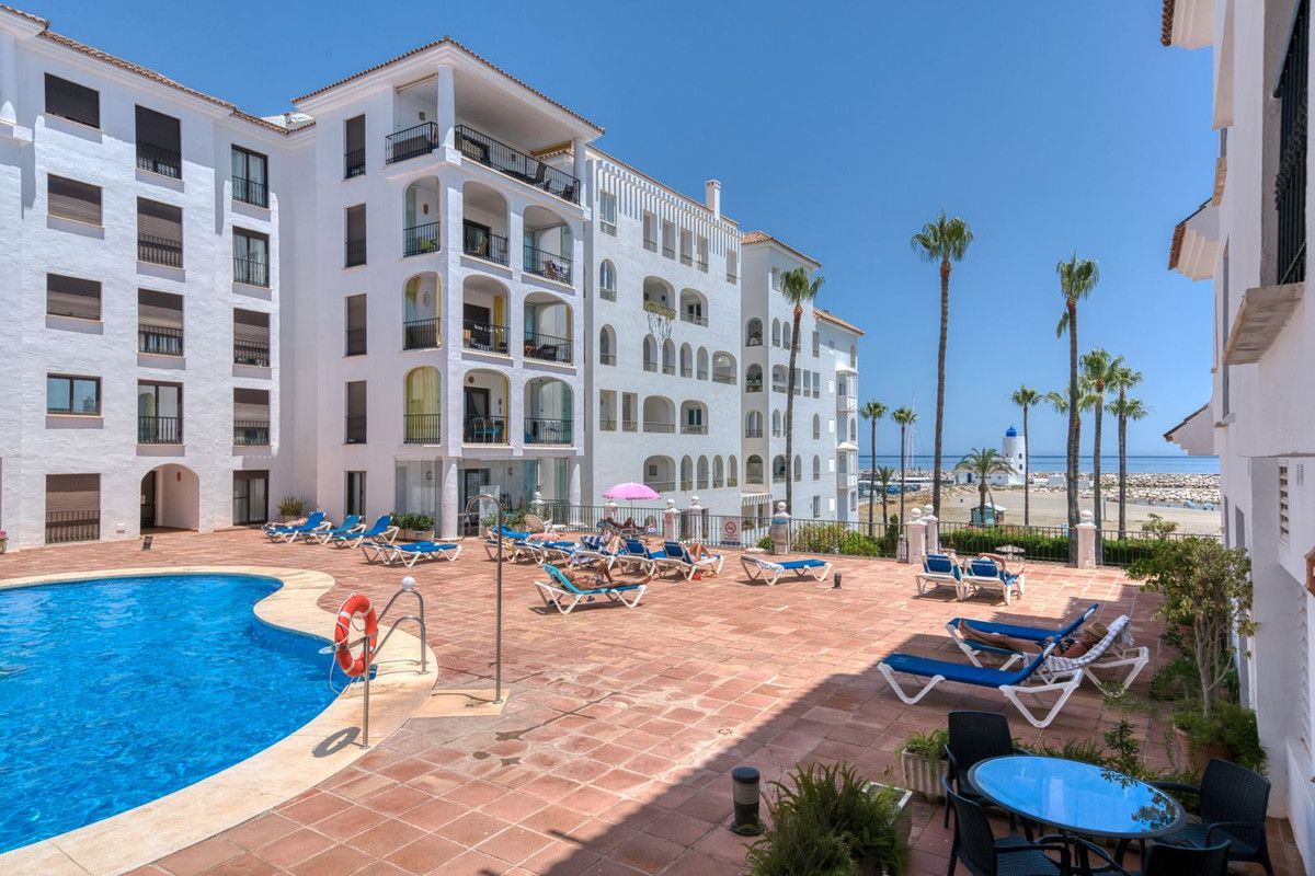Exterior view of Planta baja for sale in Manilva  with Air Conditioner, Terrace and Community pool