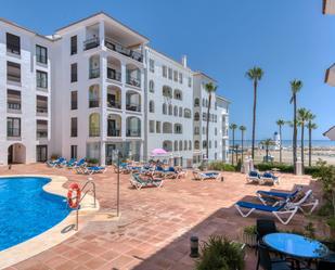 Exterior view of Planta baja for sale in Manilva  with Air Conditioner, Terrace and Community pool