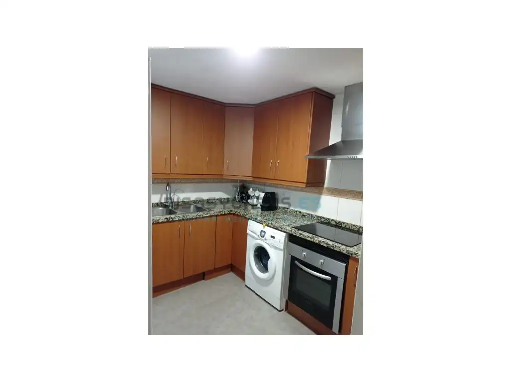 Cuina de Casa adosada en venda en Sagunto / Sagunt amb Aire condicionat, Jardí privat i Terrassa