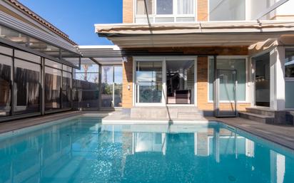 Swimming pool of Single-family semi-detached for sale in Salou  with Air Conditioner, Heating and Parquet flooring