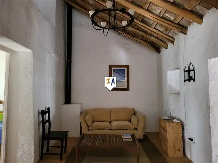 Sala d'estar de Casa adosada en venda en Lora de Estepa amb Piscina