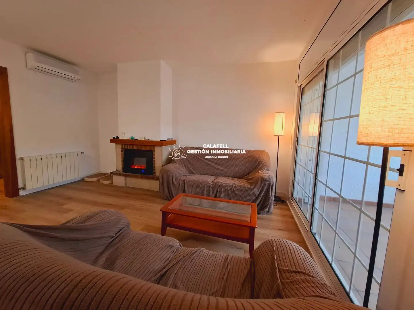 Sala de estar de Casa adosada en venta en Calafell con Aire acondicionado, Calefacción y Terraza