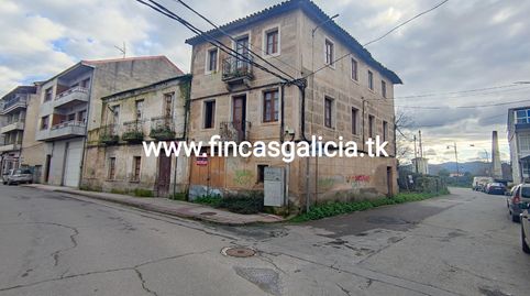 Solar con 2 construcciones