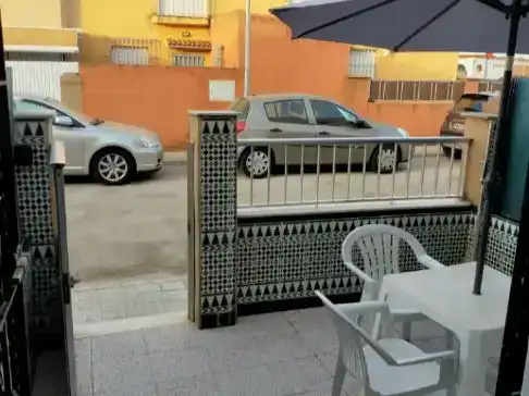 Aparcament de Casa adosada en venda en Chipiona amb Aire condicionat, Moblat i Balcó