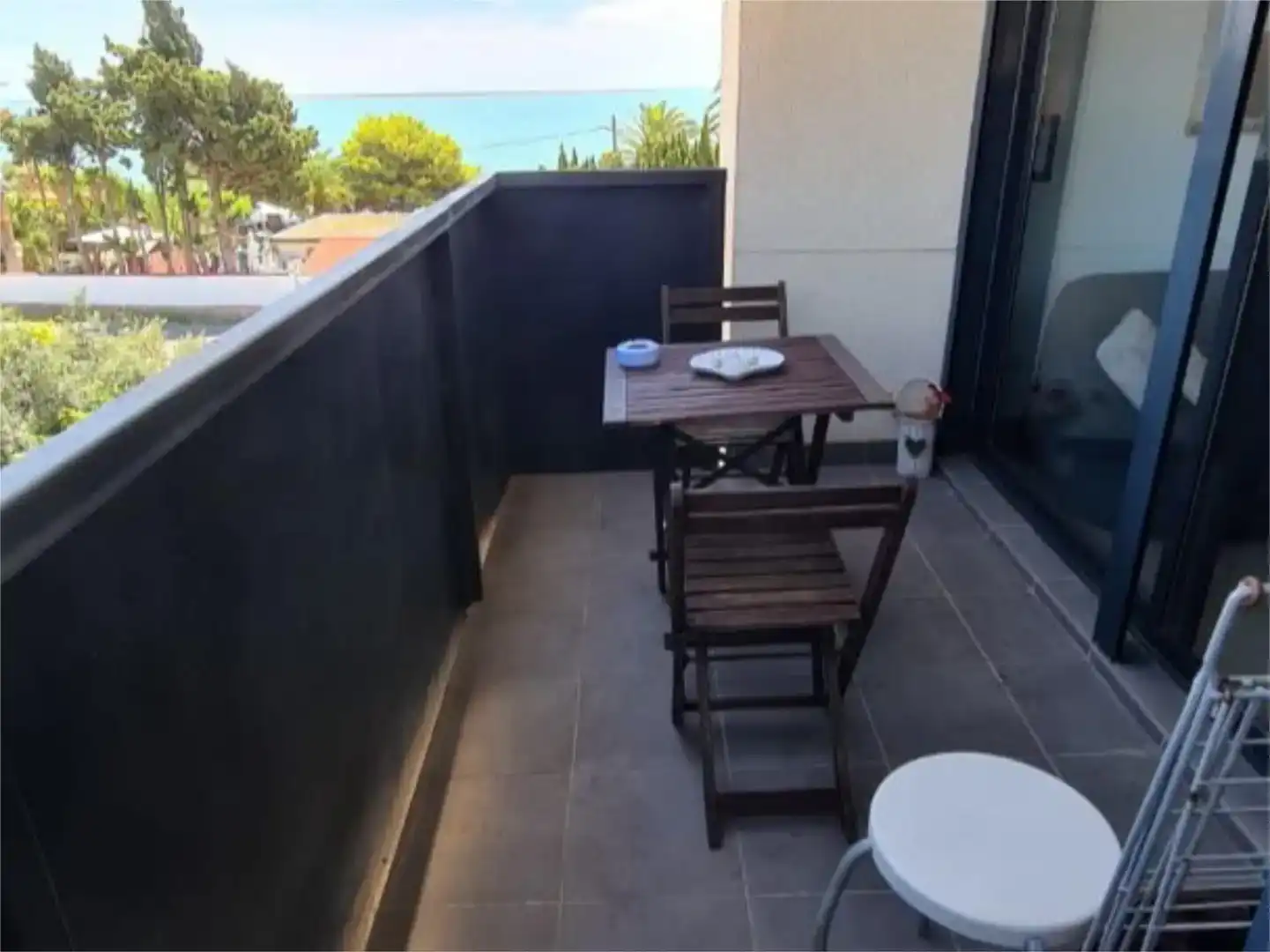Terrassa de Apartament de lloguer en Alcanar amb Aire condicionat, Jardí privat i Piscina