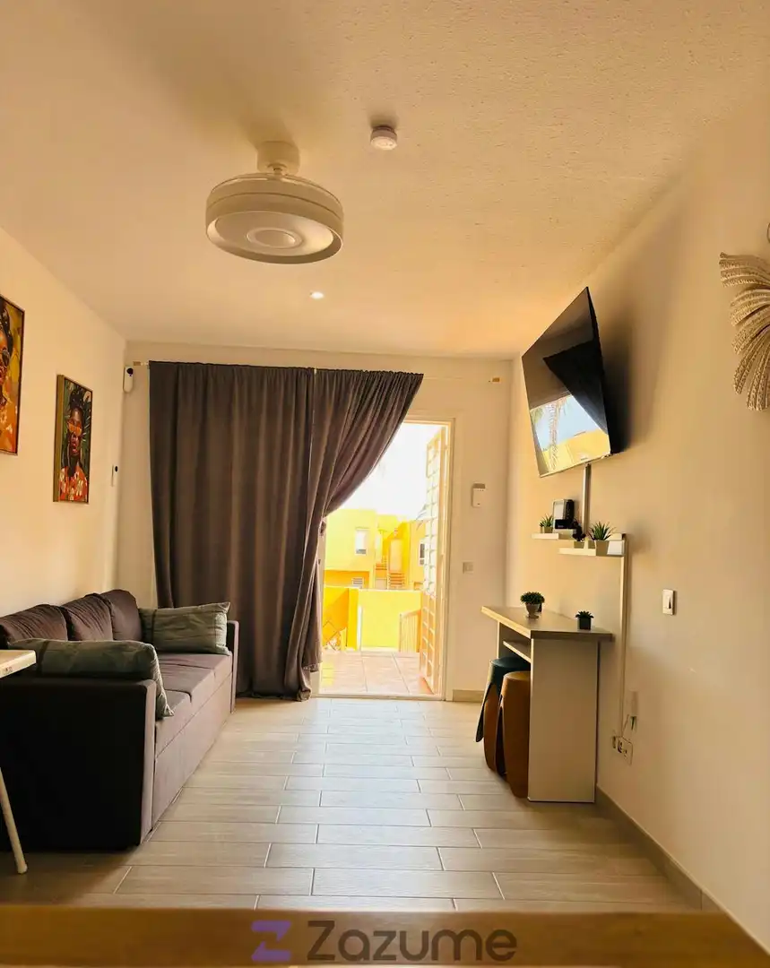 Living room of Flat for rent in Pájara  with Parquet flooring, Terrace and Swimming Pool