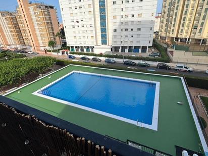 Piscina de Apartament de lloguer en La Pobla de Farnals amb Jardí privat, Terrassa i Balcó