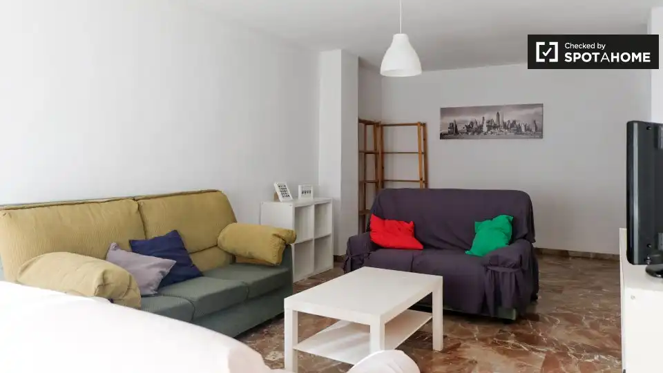 Sala d'estar de Apartament per a compartir en Granada amb Aire condicionat, Terrassa i Moblat