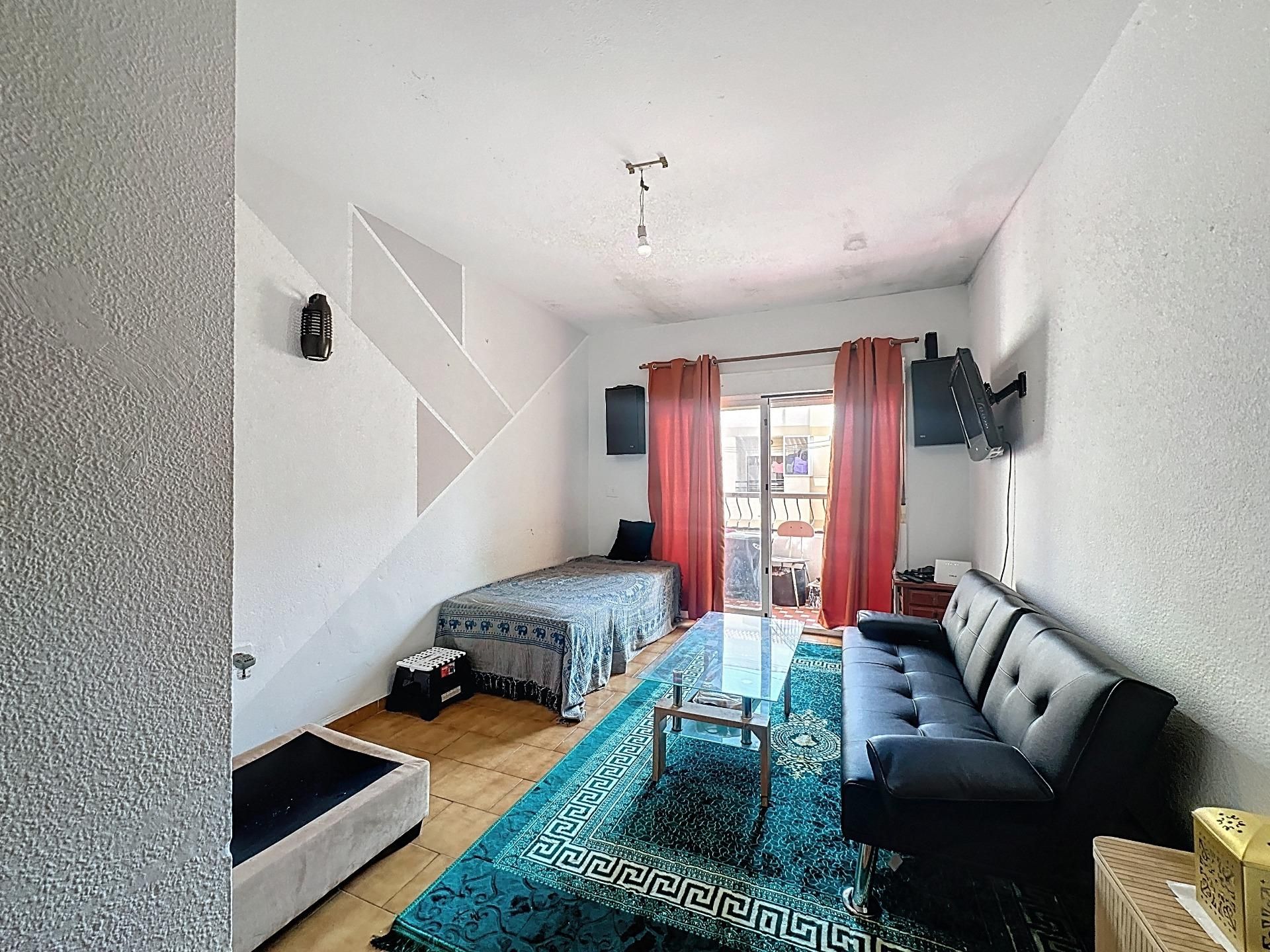 Living room of Flat for sale in Roquetas de Mar