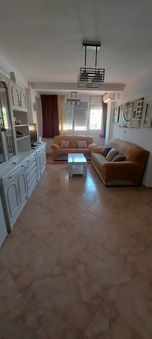 Sala d'estar de Pis de lloguer en Málaga amb Moblat