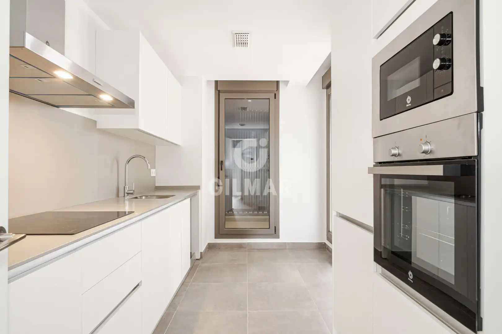 Kitchen of Flat for sale in Tomares  with Heating, Private garden and Storage room