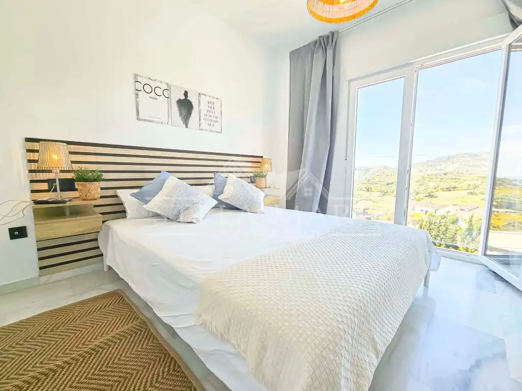 Habitación de Casa adosada en venta en Nerja con Aire acondicionado, Terraza y Amueblado