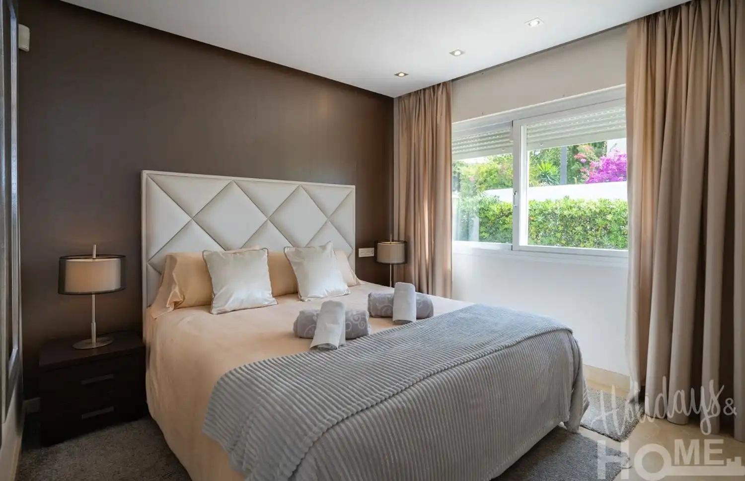 Dormitori de Pis de lloguer en Marbella amb Aire condicionat, Jardí privat i Terrassa