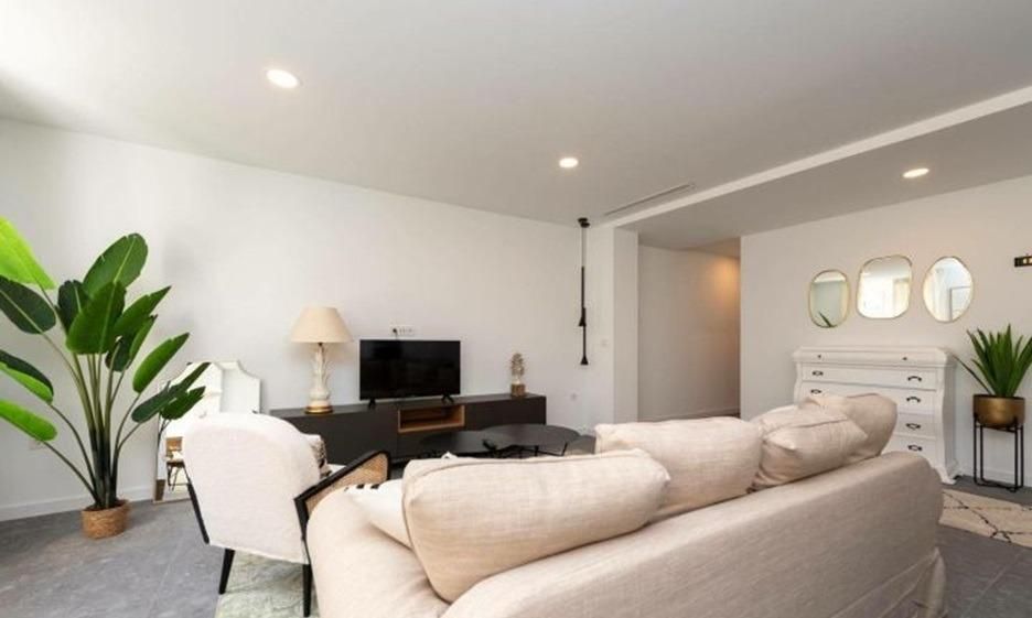 Sala d'estar de Pis de lloguer en Llanes amb Aire condicionat, Jardí privat i Terrassa