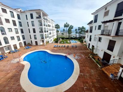 Swimming pool of Flat for sale in Manilva  with Air Conditioner, Heating and Private garden