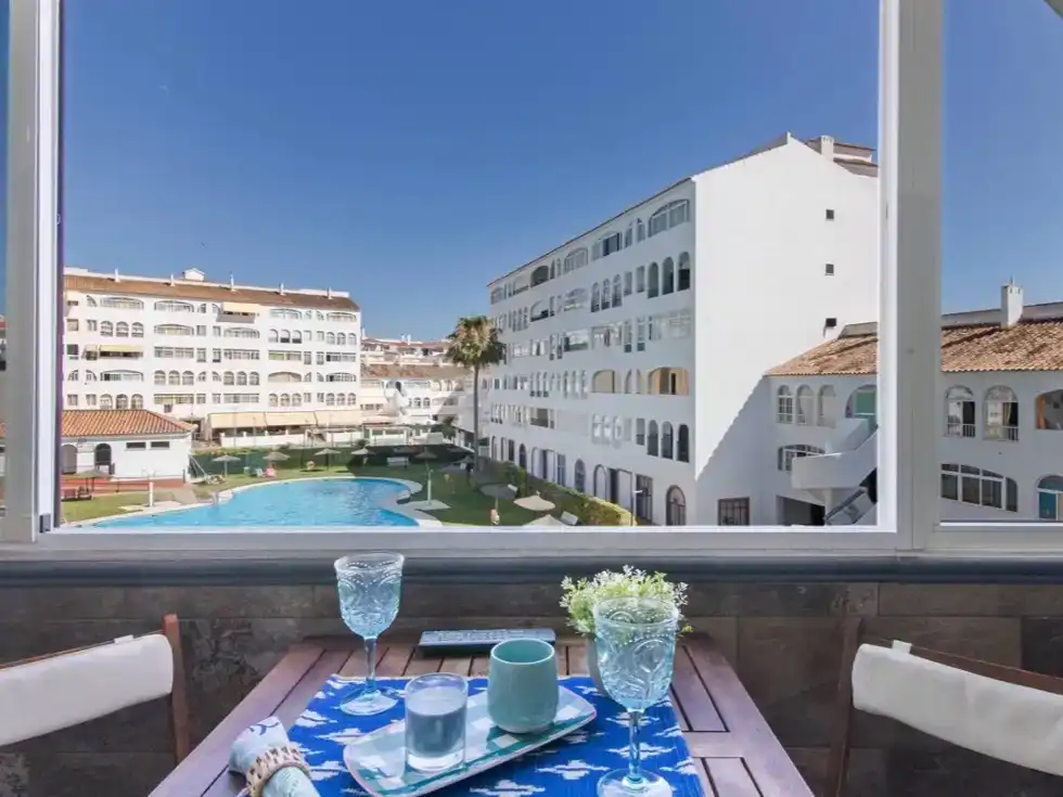 Exterior view of Flat for sale in El Portil  with Air Conditioner and Swimming Pool