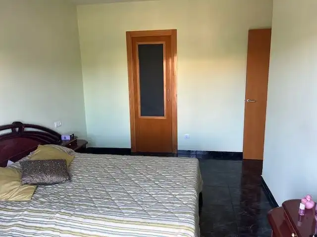 Habitación de Casa adosada en venta en Llagostera con Aire acondicionado, Calefacción y Jardín privado