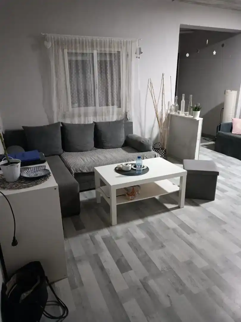 Sala d'estar de Casa adosada en venda en Escatrón amb Aire condicionat, Jardí privat i Moblat