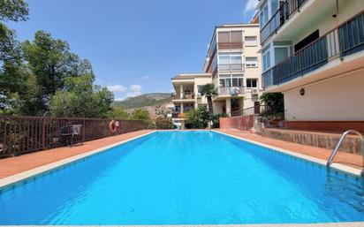 Swimming pool of Flat for sale in Sitges  with Heating, Parquet flooring and Storage room