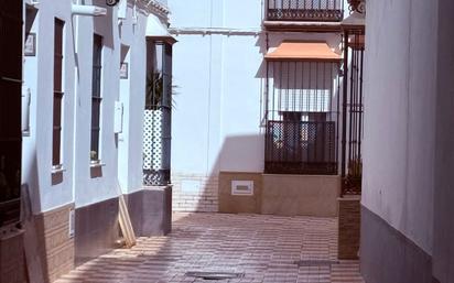 Exterior view of Single-family semi-detached for sale in Marchena  with Air Conditioner and Terrace