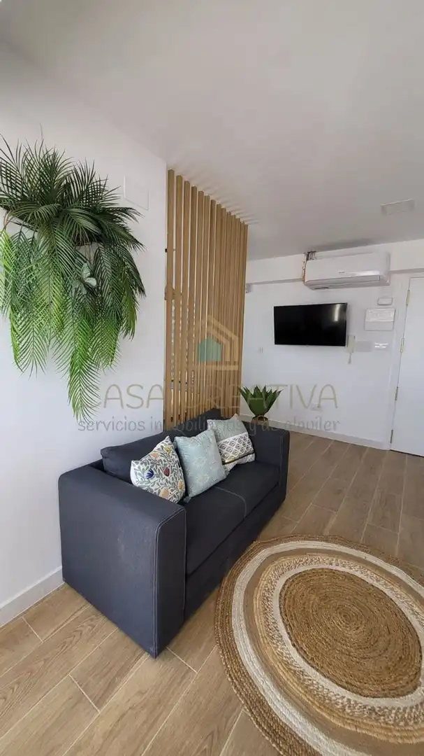 Sala de estar de Estudio en venta en Sueca con Aire acondicionado, Calefacción y Amueblado